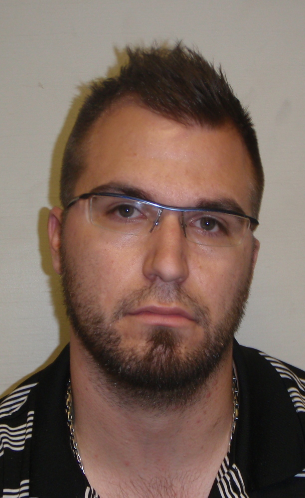 Brandon E. Ross