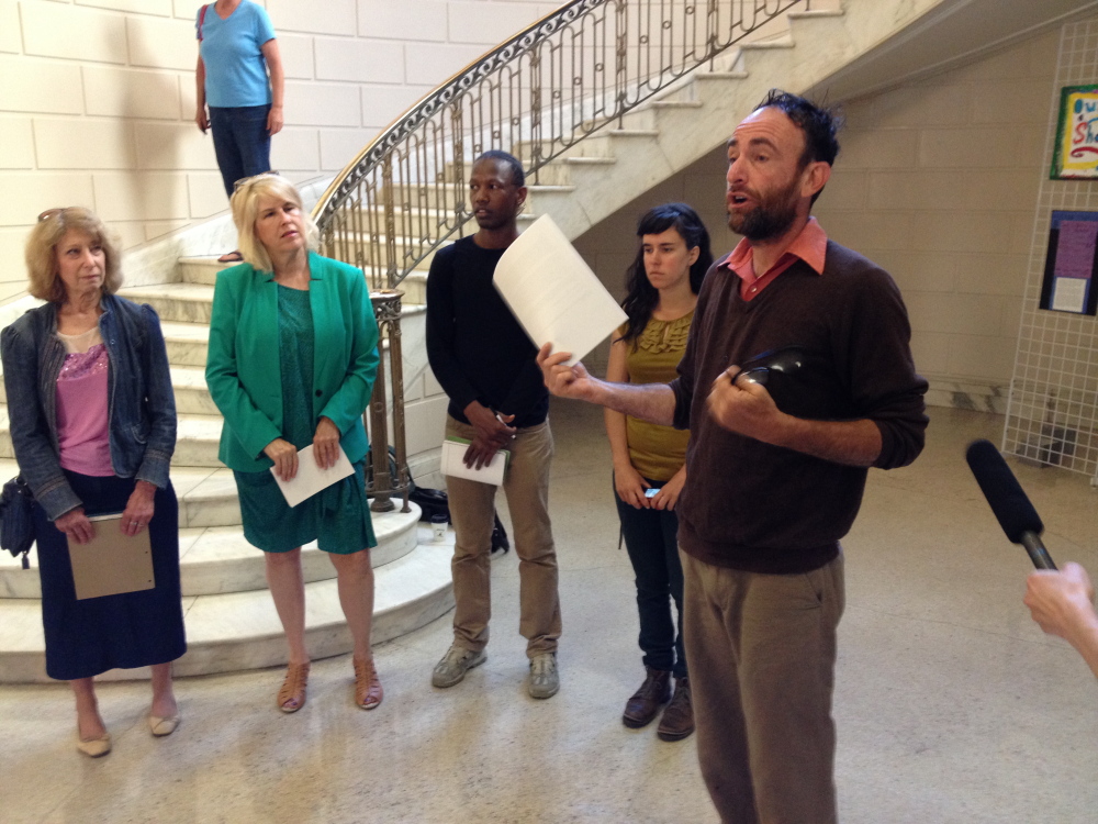 Rob Lieber, a Portland LGBT activist, speaks at a news conference Monday at Portland City Hall as local activists launch an effort to sever the city’s ties with its Sister City in Russia over that city’s treatment of its lesbian, gay, bisexual and transgendered residents.