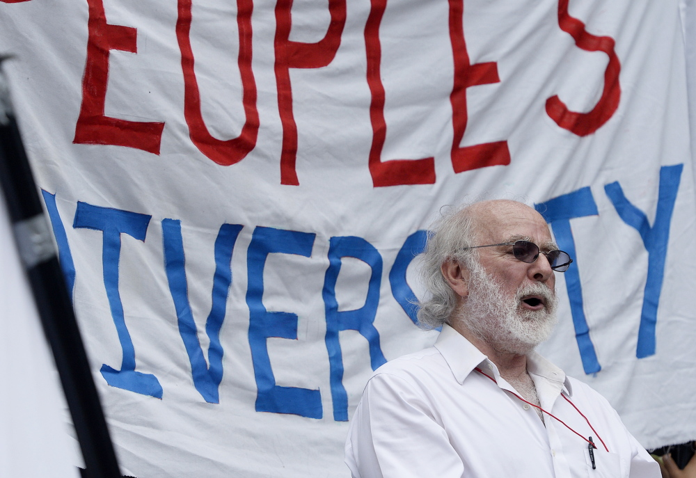 Associate Professor Barry Rodrigue speaks during a protest at the University of Southern Maine on Wednesday.