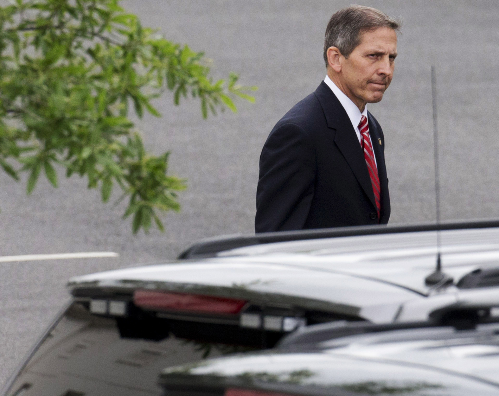 The Associated Press Deputy Veterans Affairs Secretary Sloan Gibson leaves the White House on Friday after being named by President Obama to run the VA Department on an interim basis.