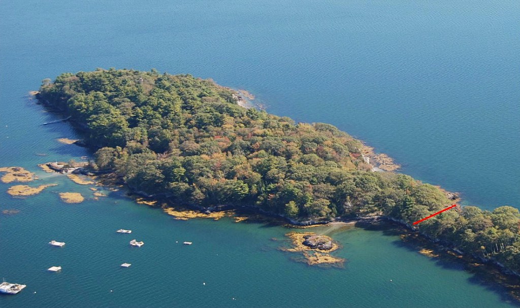 In this photo from the The Maine Coast Heritage Trust, a red line indicates the portion of the island that will be acquired for conservation.