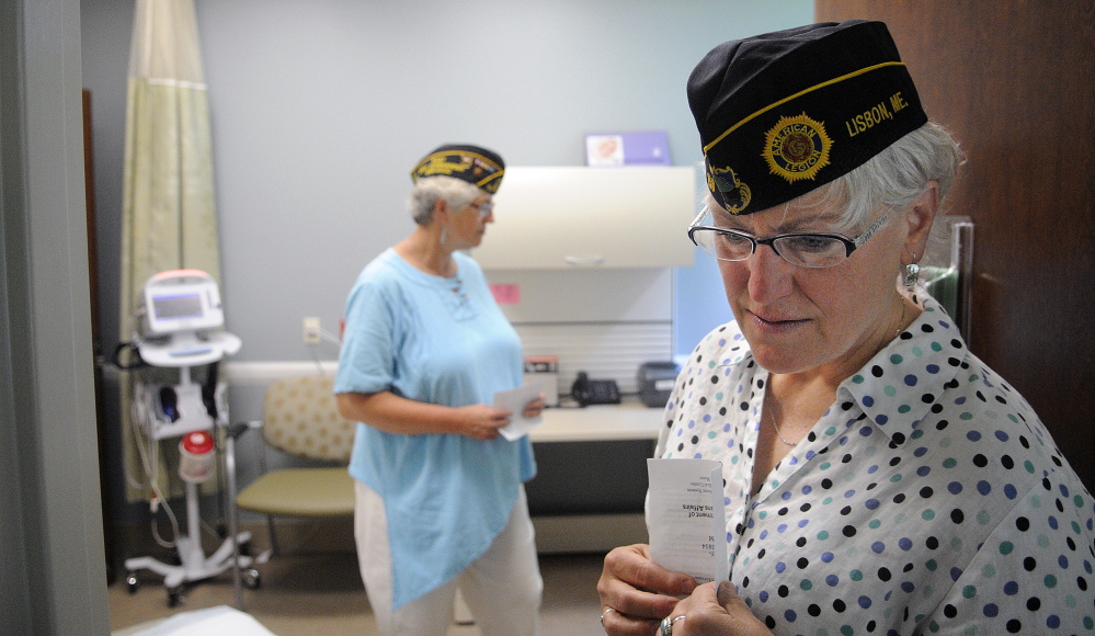 Brenda Confer, right, and Mona Naragon inspect an exam room Monday at the women’s clinic at the VA Maine Healthcare Systems-Togus. The veterans, both residents of Lisbon, were on hand for the grand opening.