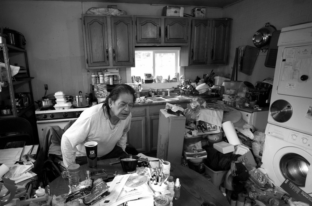 Richard Dana, aka “Stubby” to those who know him, takes a seat in a wheelchair at his Indian Township home recently. Dana is disabled from an accident he had while working with steel at Bath Iron Works about 30 years ago. He now relies on elver fishing to eke out a modest living.