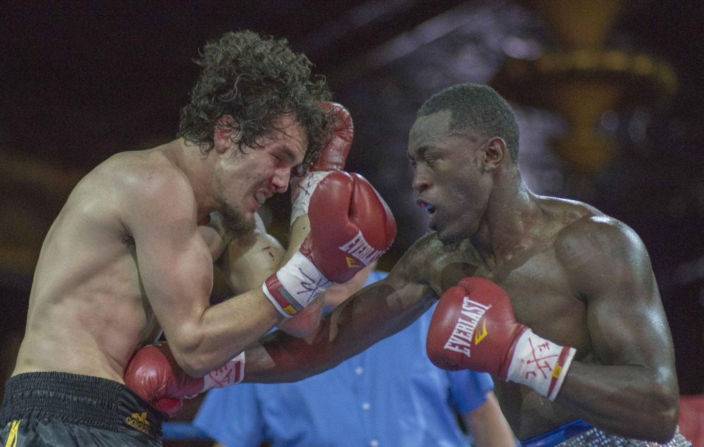 Russell Lamour of Portland, right, won a unanimous decision Saturday night against Saul Almeida of Framingham, Mass., but wasn’t happy with his performance.