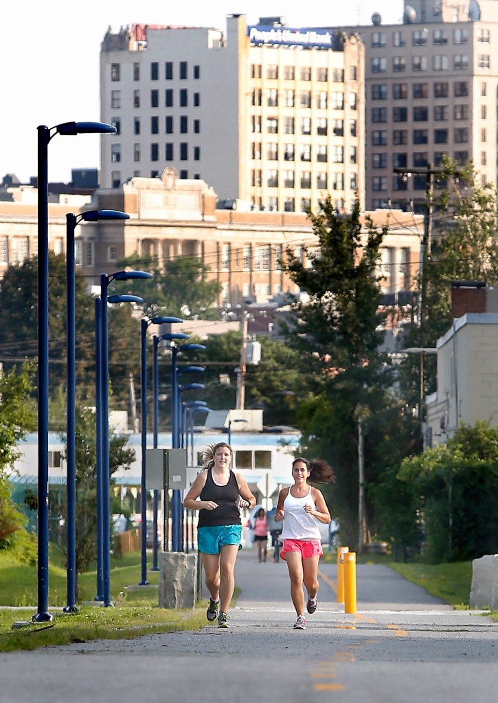 Jenn Granata, left, and Amanda Bellerose, both of Scarborough, have trained for nearly a year to run in the Beach to Beacon for the first time. Now, about those hills …
Tim Greenway/Staff Photographer