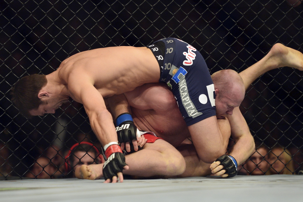 Tim Boetsch of Lincolnville, known as The Barbarian, looks to escape a hold in a recent fight. Boetsch will be having more than a homecoming when he fights in Bangor next Saturday. He could be fighting for his UFC career after losing three of his last four fights.