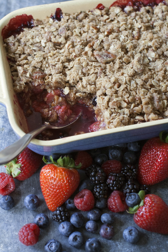 Summer crisp with pecan streusel topping. The addition of orange liqueur is optional, but it can make big difference in this summer dessert.