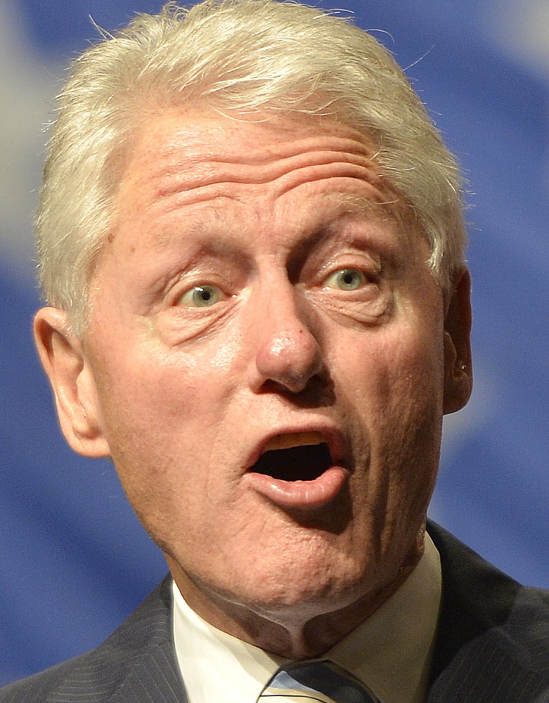 Former President Bill Clinton speaks to a group of supporters during a rally for Kentucky Democratic Senatorial candidater Alison Lundergan Grimes, Wednesday, Aug. 8, 2014, at the Hal Rogers Center in Hazard, Ky. (AP Photo/Timothy D. Easley)