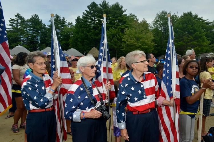 Elaine Greene, right, one of the three Freeport Flag Ladies, has been hospitalized for a week.