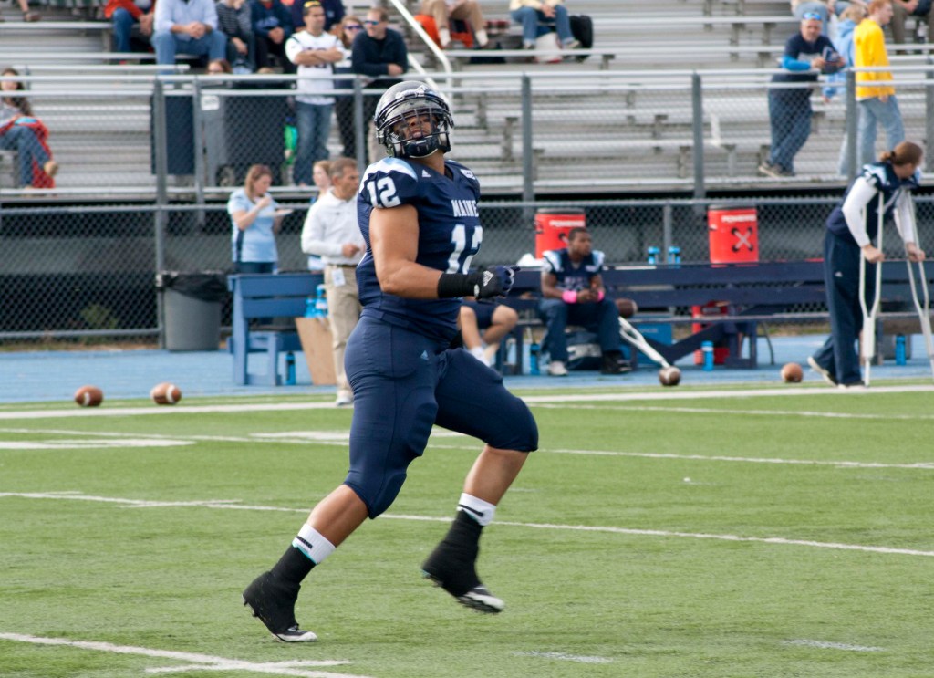 Although mainly used as the lead blocker for the tailback, fullback Carlton Charles of Maine can haul in a pass on a short route when needed. Photo courtesy of UMaine