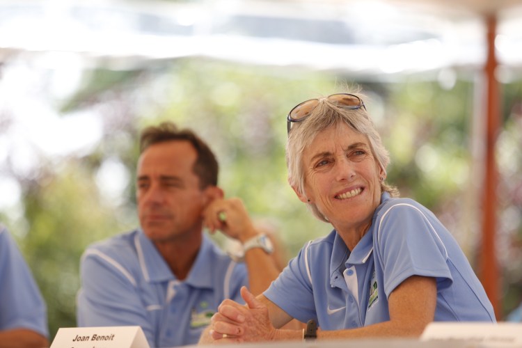 Joan Benoit Samuelson listens as the top Maine runners are introduced at the TD Beach to Beacon 10k press conference at the Inn by the Sea Friday morning. Gabe Souza / Staff Photographer
