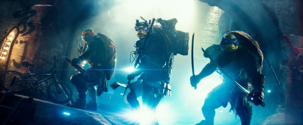 From left, Michelangelo, Donatello, and Leonardo in a scene from "Teenage Mutant Ninja Turtles." 