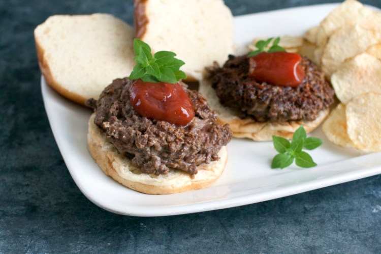 Savory, delicious chop your own burgers. The trick to chopping the beef is to cut it into 1-inch chunks, then freeze it for about 15 minutes until it is just firm. These partially frozen chunks chop perfectly in the food processor without becoming overworked.