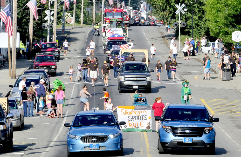 Police, firefighters, mutant turtles and public office candidates made up the Labor Day parade down Main Street in Norridgewock on Monday. Kennebec Journal Staff Photo by David Leaming
