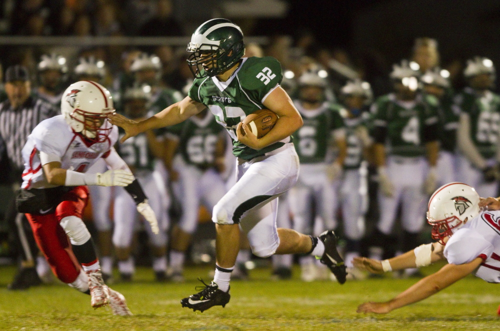  Bonny Eagle RB Matt Smith carved up huge yardage and multiple touchdowns to lead the Scots to a 40-0 halftime lead against  Sanford in varsity football action on Friday. Carl D. Walsh/Staff Photographer