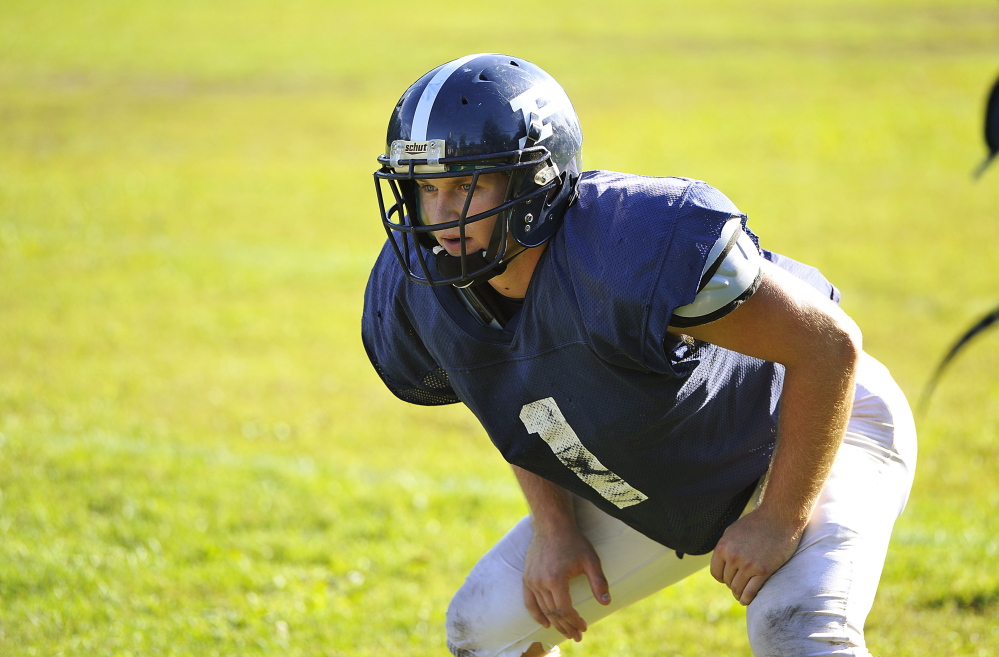 Ryan Ruhlin didn’t sulk when told after his sophomore season that he no longer would be Portland’s starting quarterback. Instead he’s hunkered down and turned not only into a captain but one of the most important players on the team.