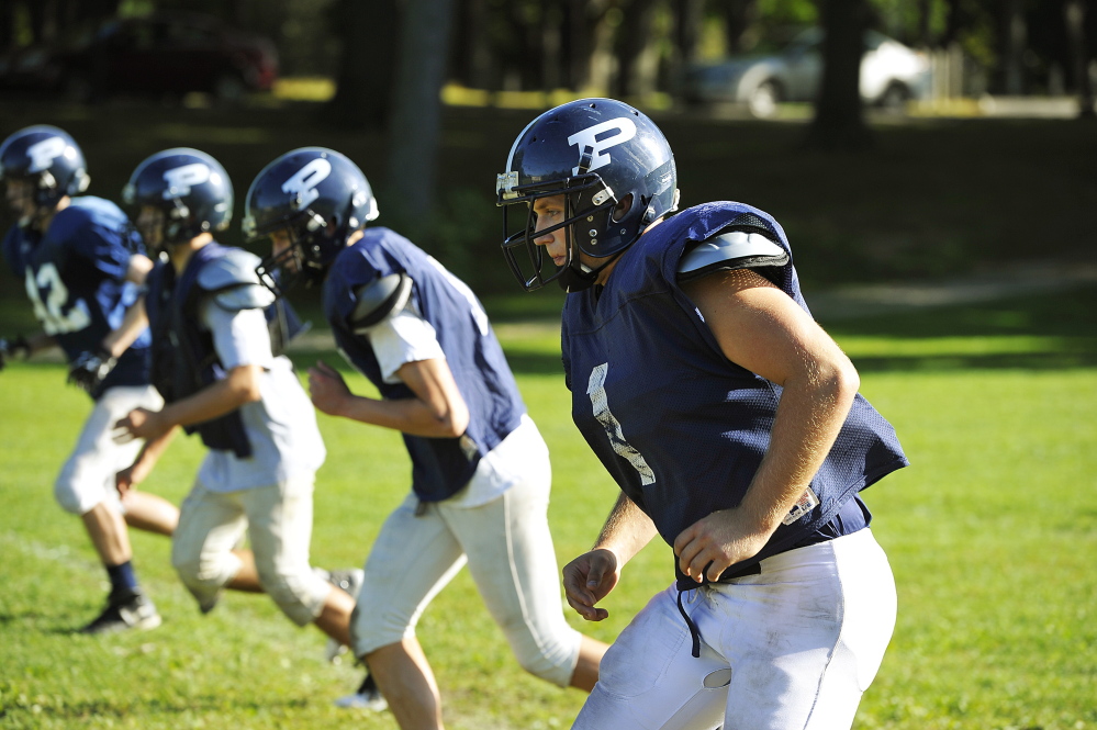 Ryan Ruhlin is so respected at Portland High that not only is he a football captain, but he may end up also as a captain on the hockey and baseball teams. Gordon Chibroski/Staff Photographer