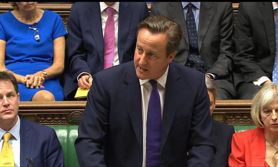British Prime Minister David Cameron speaks during the debate in the Houses of Parliament, London, Friday, Sept. 26, 2014. David Cameron told lawmakers “there is no more serious issue than asking our armed forces to put themselves in harm’s way to protect our country” as he set out the case for British participation in air strikes against Islamic State militants in Iraq. (AP Photo/Parliamentary Recording Unit via Associated Press)  TV OUT