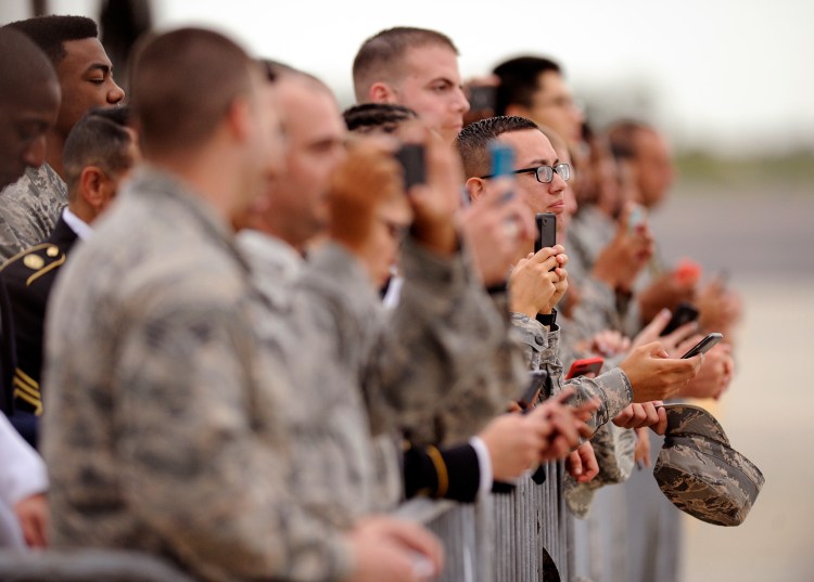 Soldiers wait for President Barack Obama to arrive at MacDill Air Force Base in Tampa, Florida, on Tuesday. The Associated Press