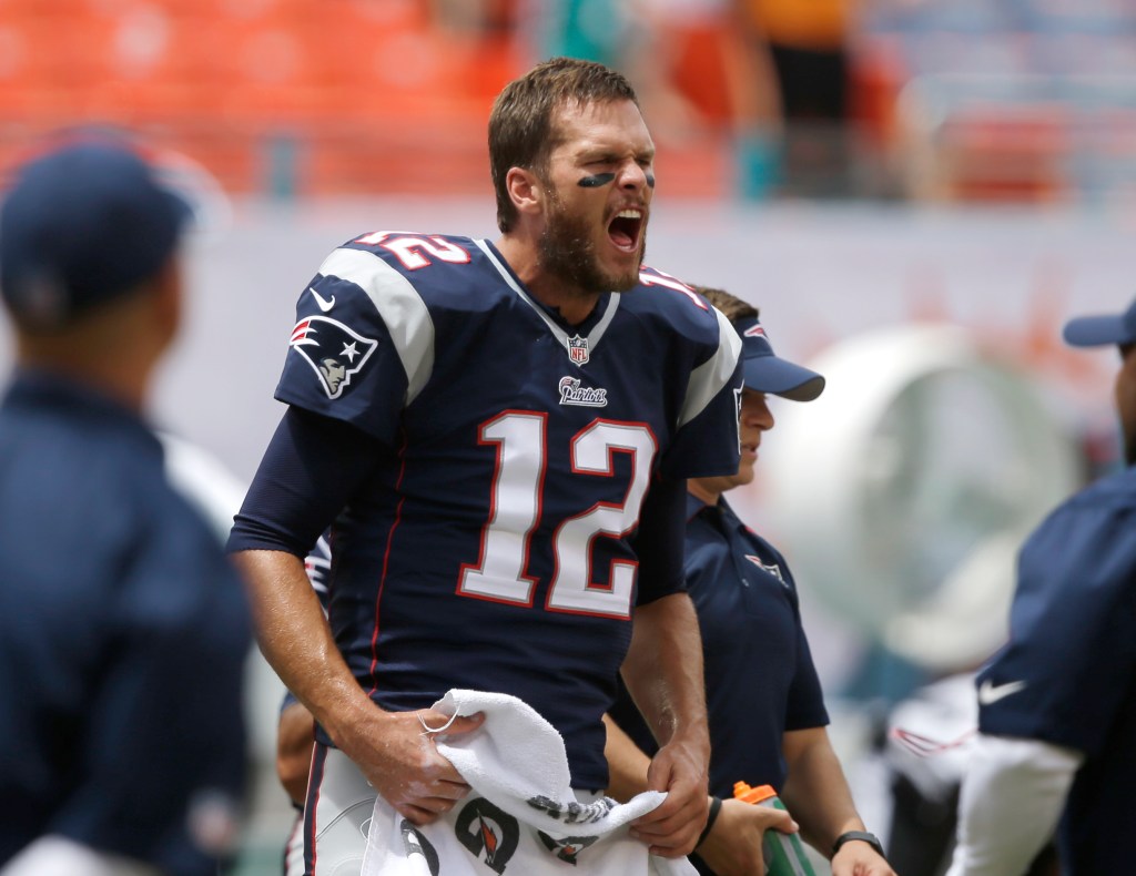 Patriots quarterback Tom Brady calls out during warm-ups before Sunday's game in Miami. The Associated Press