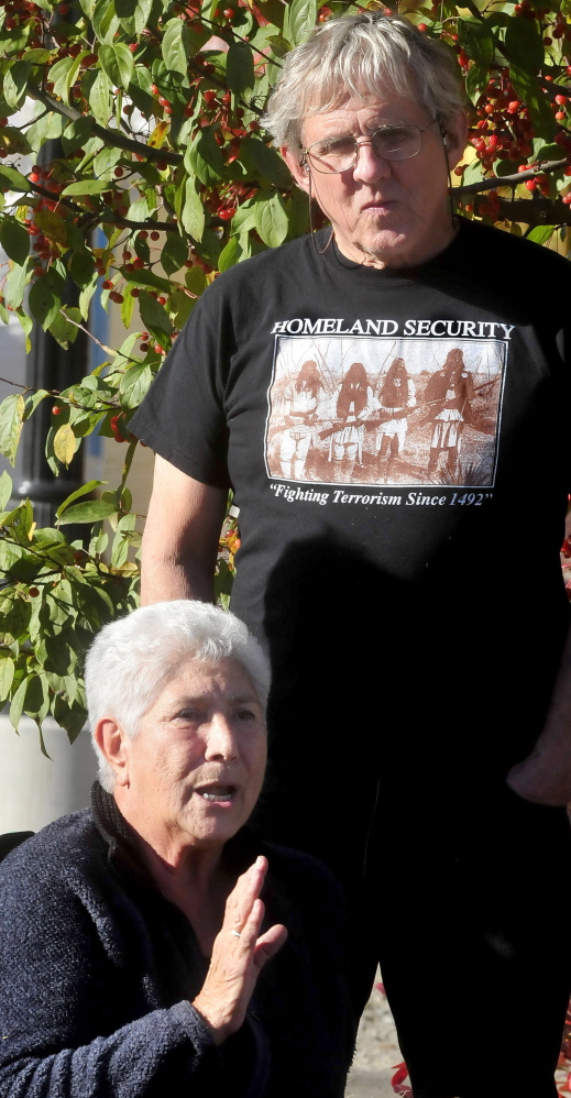 Madonna Soctomah of the Passamaquoddy tribe urges people to learn more about indigenous people as Mark Roman waits his turn to speak Monday in Skowhegan.