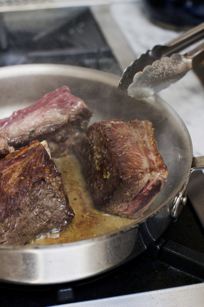 Searing the short ribs.