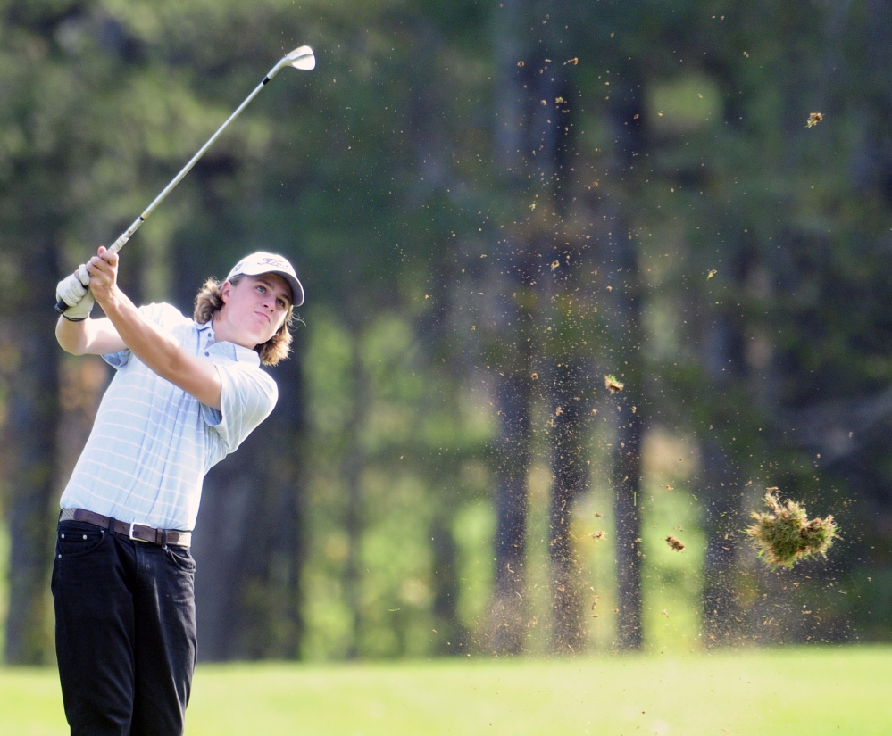 Cape Elizabeth’s Reese McFarlane hits an approach shot on the 17th hole of the Tomahawk course at Natanis Golf Course during the individual state golf championship Saturday. McFarlane finished second in Class B.