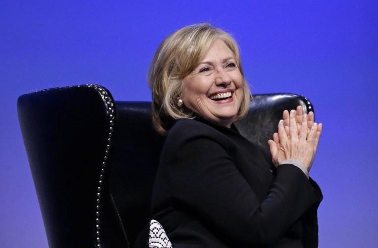 Former U.S. Secretary of State Hillary Rodham Clinton smiles during an interview at the Dreamforce convention Tuesday, Oct. 14, in San Francisco.
