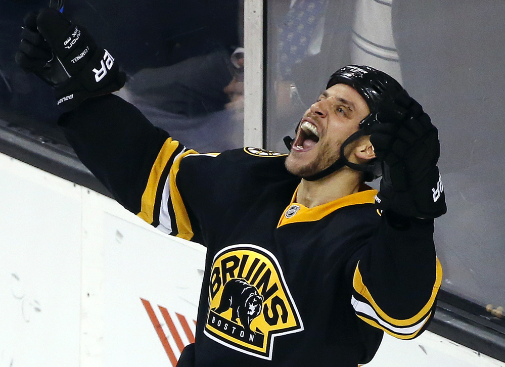 Boston Bruins center Gregory Campbell celebrates his third-period goal, which proved to be the game winner against the San Jose Sharks on Tuesday night in Boston.