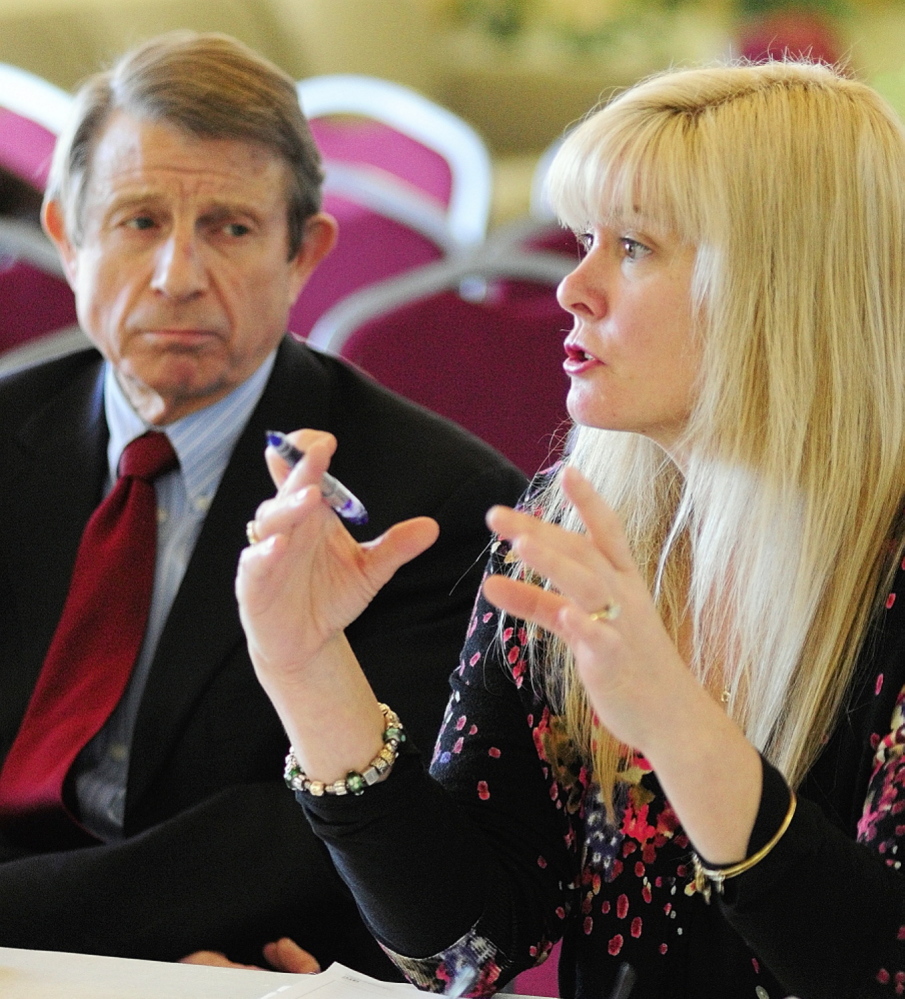 Maine Virtual Academy board chairwoman Amy Carlisle and board secretary Peter Mills appear before the charter school commission in February. She told the panel Monday that “this is going to be ... Maine management from the top down.”