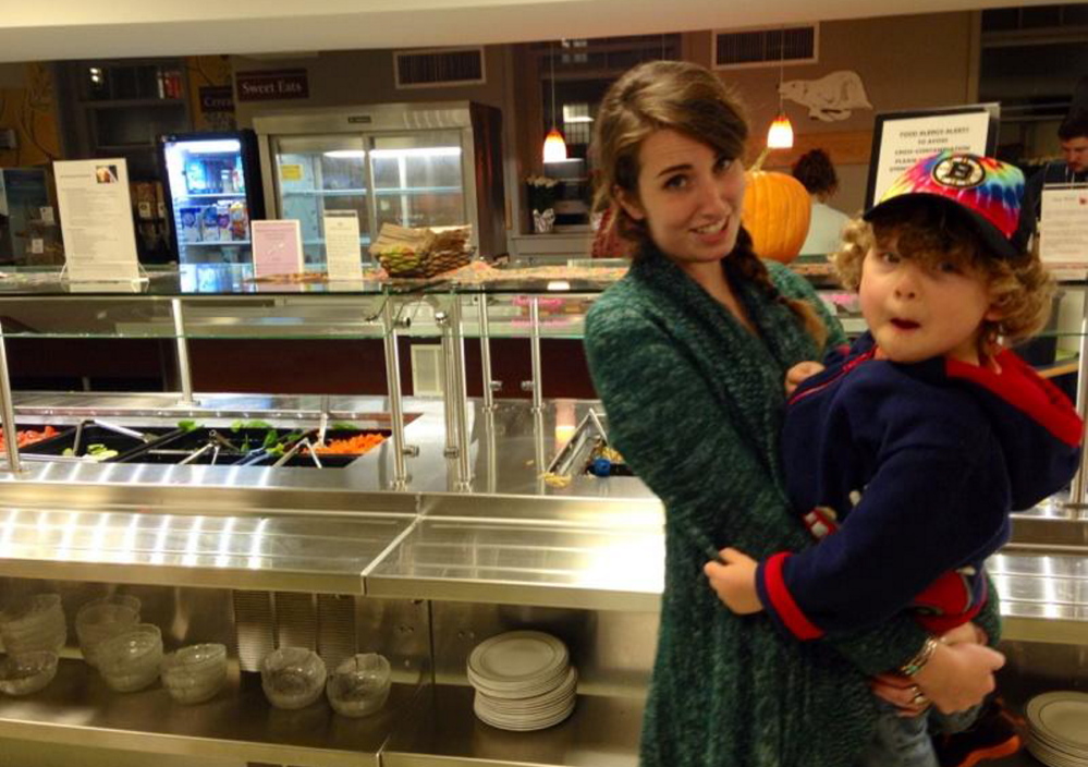 Baby sitter Nicole Smith, Bowdoin College class of 2016, with the author’s son, Theo. Smith takes Theo to a Bowdoin dining hall while his parents grab a precious hour for a midweek date.