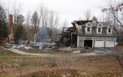 Police arrested Logan Valle on unrelated charges after his parents’ home in Falmouth was destroyed by fire late Saturday. His parents were not home at the time, neighbors said. Jill Brady/Staff Photographer