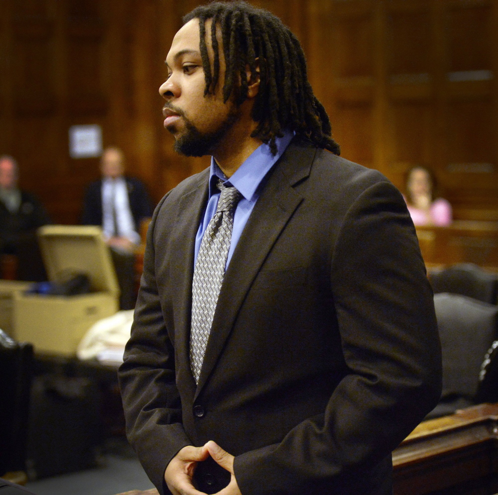 Tareek Hendricks, seen in court Tuesday, is accused of fatally stabbing Robert Stubbs and injuring Melissa Stubbs with the same knife in their duplex apartment in Westbrook.