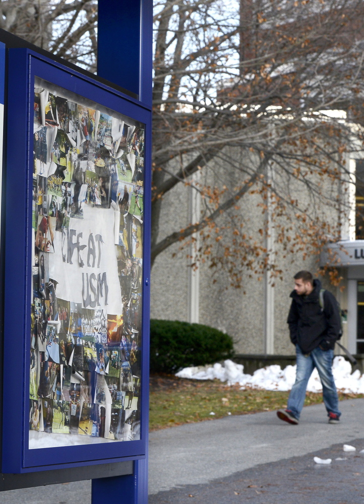 Students walk out of Luther Bonney Hall at USM in Portland, which is attempting to reclaim its roots as a metropolitan university.