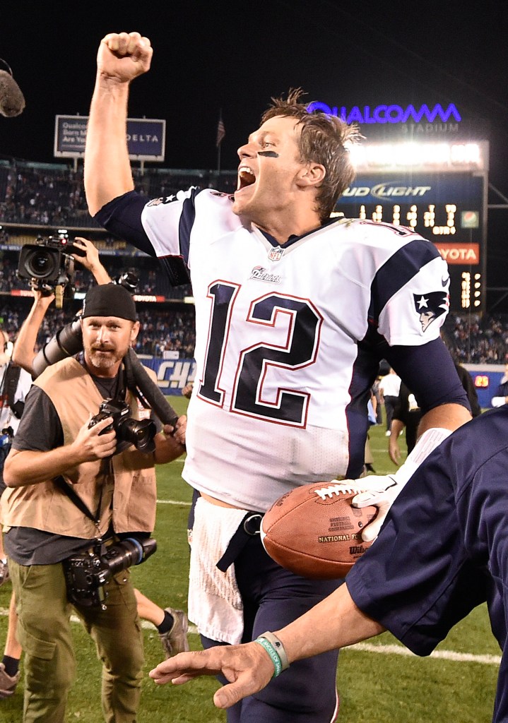 New England Patriots quarterback Tom Brady celebrates after the Patriots beat the San Diego Chargers 23-14, Sunday in San Diego.  The Associated Press