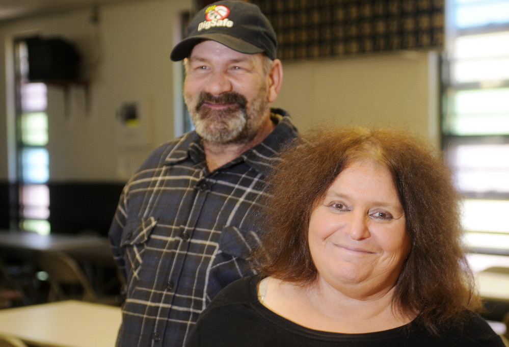 Nelson and Sherry Lavigne, at the Winthrop Hot Meal Kitchen on Thursday, were delivering meals Wednesday when they found 99-year-old Gordon Alcott lying outside on his back porch, unable to get back in the house.