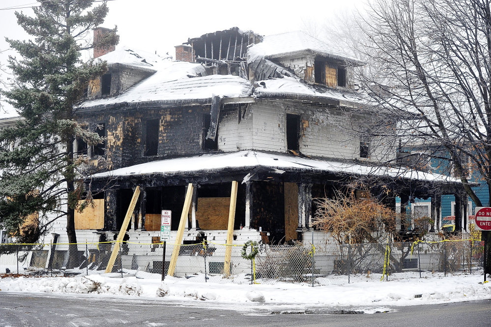 The three-story, two-unit apartment building at 20-24 Noyes St. in Portland, where a fire on Nov. 1 killed six young adults.