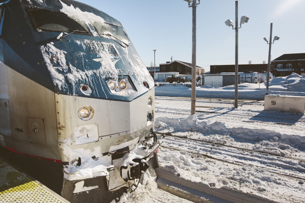 Whitney Hayward/Staff Photographer
The Downeaster from Boston arrives at the Portland Transportation Center platform Friday. Passengers headed to Boston on Thursday were stranded when a mechanical problem with the train left it stuck in North Berwick.