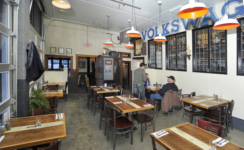 The interior at Otto in South Portland reflects the building's former life as a gas station.