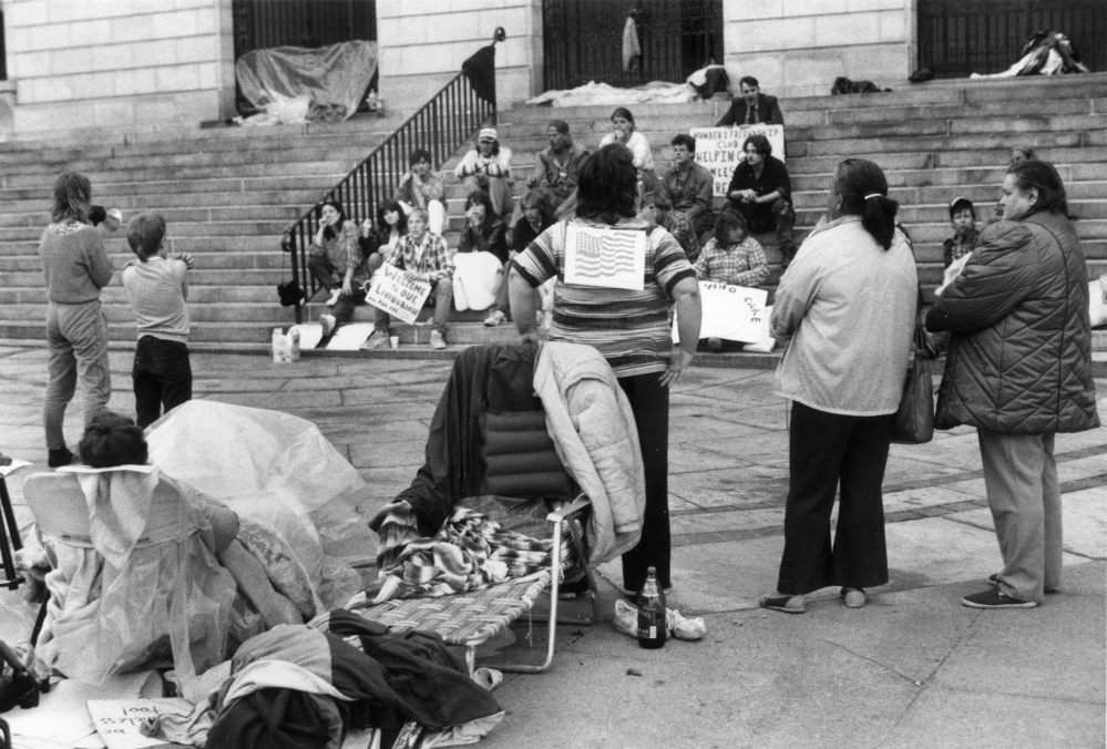 Homeless people camp out on the plaza at Portland City Hall on July 4, 1987, as part of a protest that began July 1. The group eventually moved to nearby Lincoln Park, to protest the closure of a private shelter.