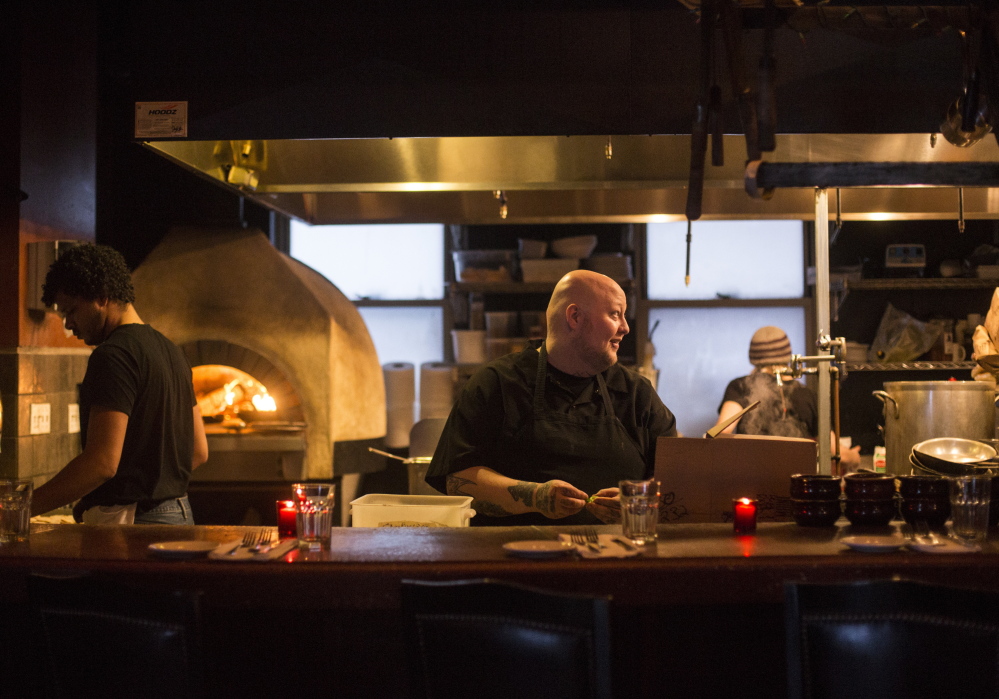 Robert Meixelbergerosborne prepares Brussels sprouts at The Grill Room & Bar.