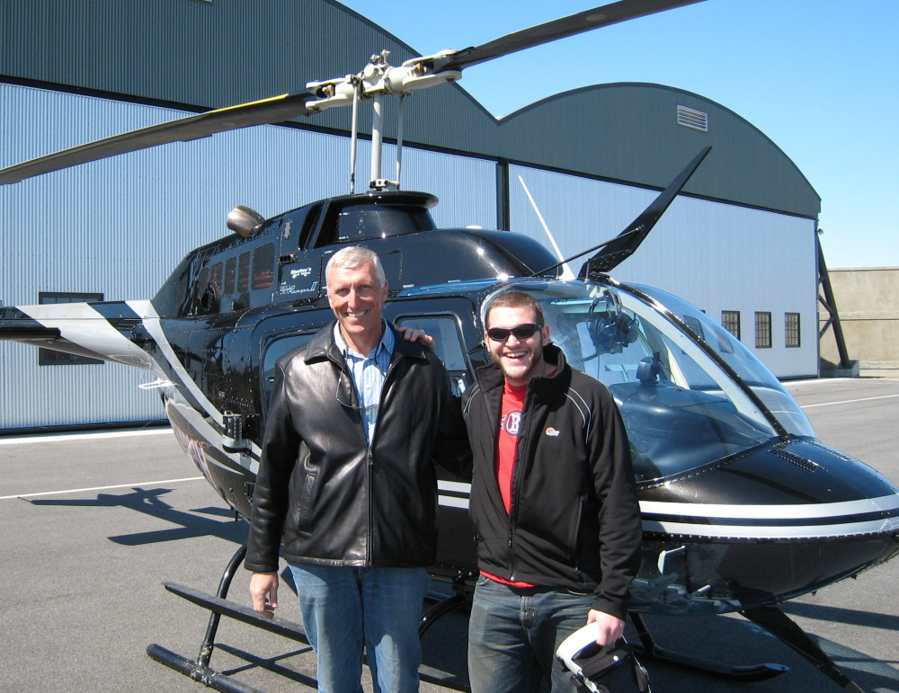 Michael Scarks, left, who died unexpectedly Thursday, had a passion for flying, said his son Stefan, also photographed here. The elder Scarks was an prominent real estate developer.