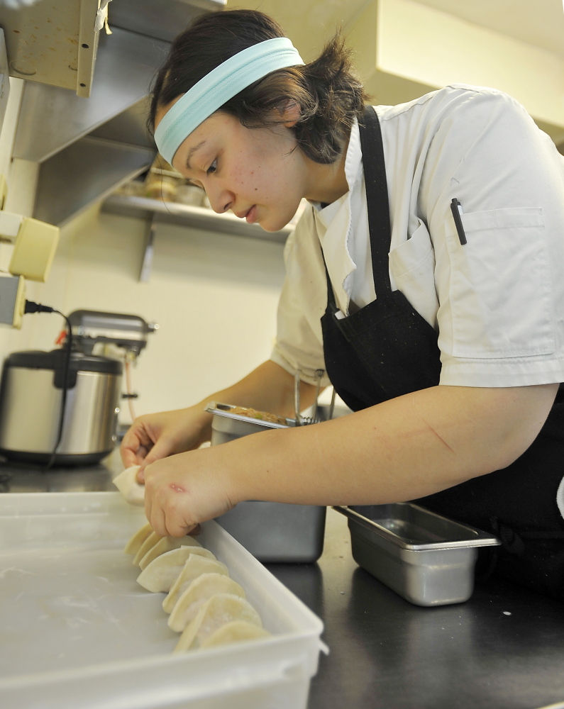 Cara Stadler, chef and co-owner of Tao Yuan in Brunswick and Bao Bao Dumpling House in Portland, says she loves “the insanity of the kitchen.”