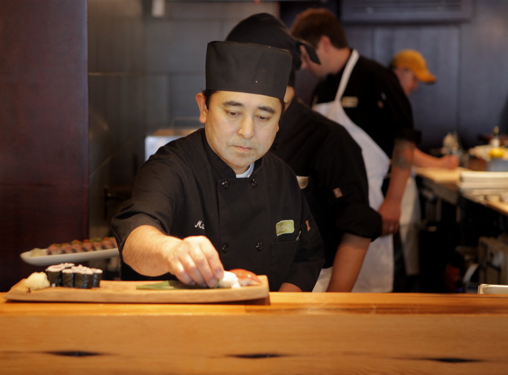 Chef Masa Miyake, a James Beard Award nominee for Best Chef: Northeast, prepares lunch at his restaurant on Fore Street in Portland.