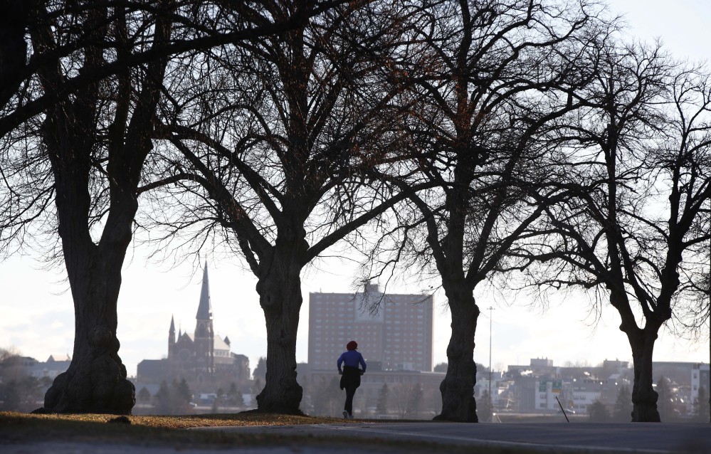 A jogger runs along the Back Cove trail in Portland in December. Health rankings in southern coastal Maine are particularly favorable compared to the national median – but the same isn’t true for the state’s rural counties.