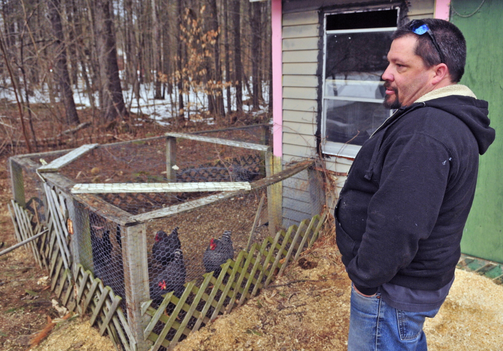 Henry Tuttle talks about a recent dog attack on his chicken coop on Wednesday in Litchfield.