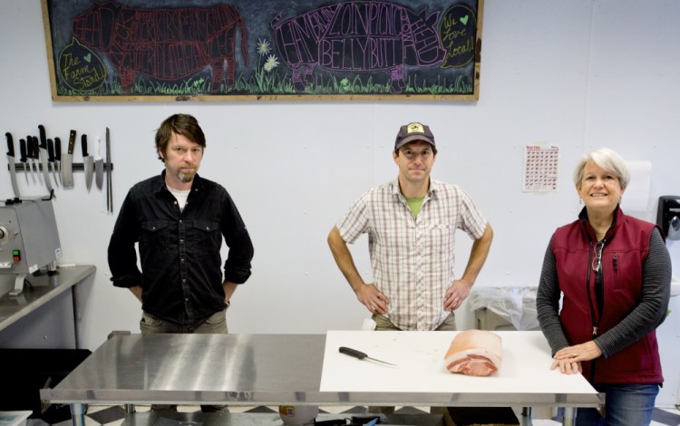 Joe Fournier, Ben Slayton and Penny Jordan operate The Farm Stand store in South Portland.