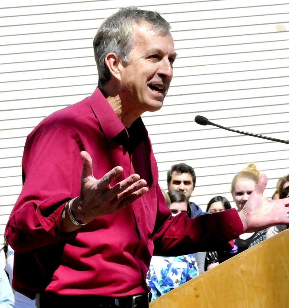 Colby College professor Walter Hatch implores students and staff to become involved in addressing racial issues during a forum at the college Thursday.