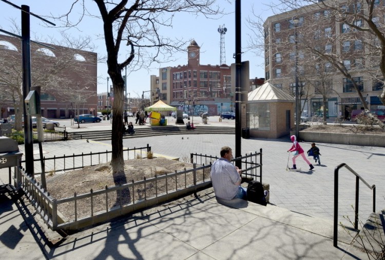 Visitors gather at Congress Square Park in Portland, to which Southwest Airlines has given a grant for improvements.