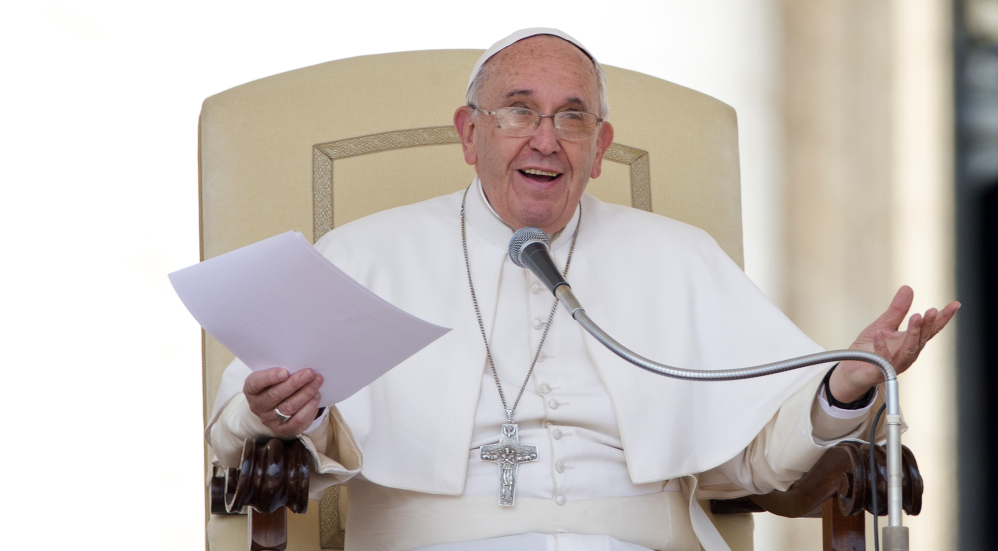 Pope Francis delivers his message during the weekly general audience in St. Peter’s Square at the Vatican.